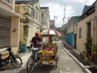 Een trishaw (een soort riksja) in Chinatown. De ene is nog fantastischer versierd dan de andere. Inclusief geluid!!