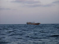Vissersboot met drijfnetten